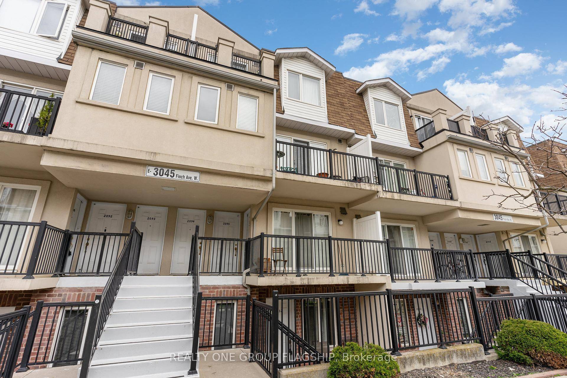 This bright and spacious unit features an open concept living and dining area, a full kitchen with a breakfast bar, and two modern washrooms.