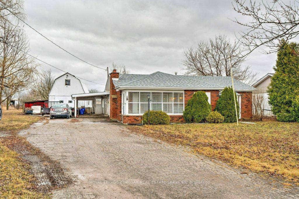 An exceptional and rarely offered 3 acre parcel of land situated just outside the official city limits of Stoney Creek.