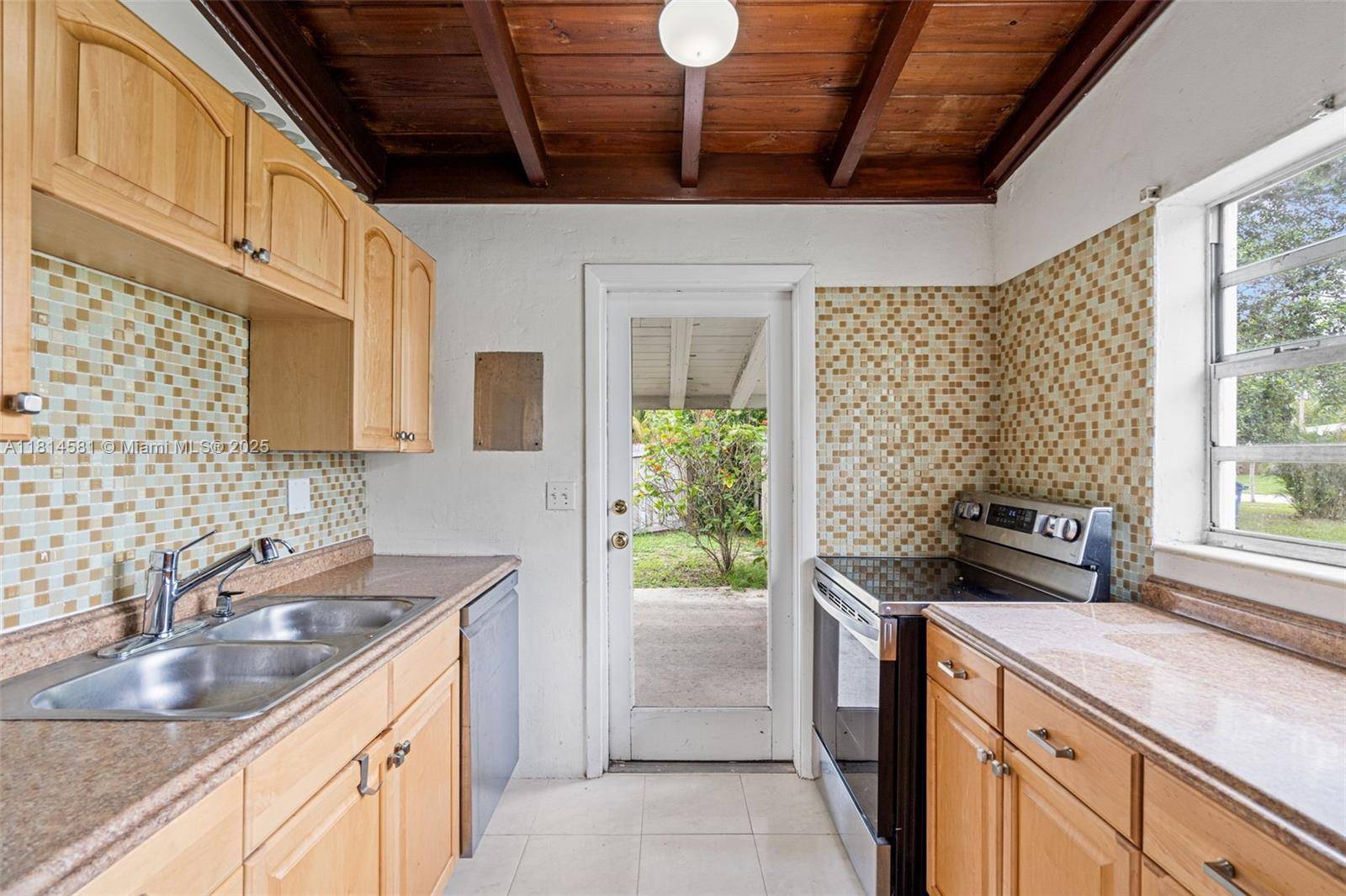 Welcome to this beautifully 3 bedroom, 2 bath family home that seamlessly blends timeless Art Deco character with modern finishes.