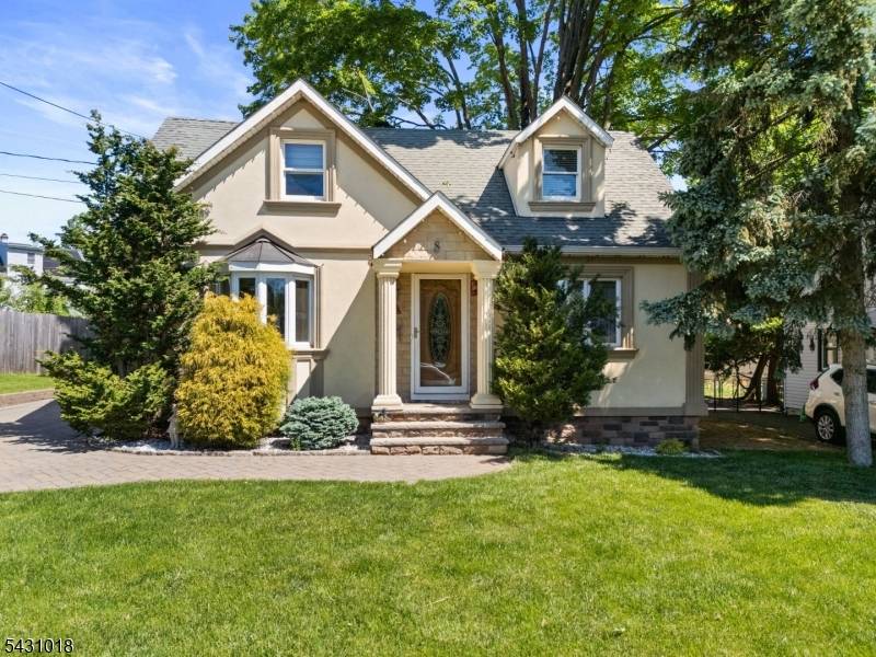 Nestled on a beautifully maintained property, this stunning 3 bedroom, 2 bath Cape Cod is in absolutely perfect condition and completely move in ready.