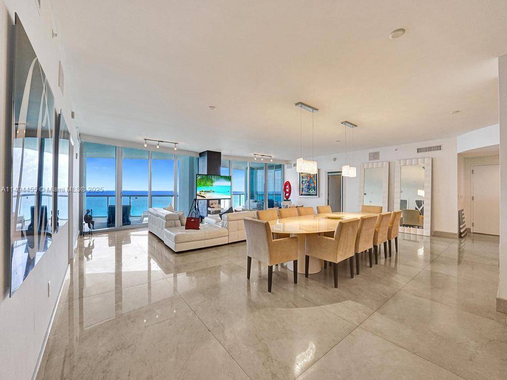 Wow ! Perfect 10 ! Enter this Beachfront Palace in the Sky through private elevator foyer and immediately see the best direct ocean views throughout !