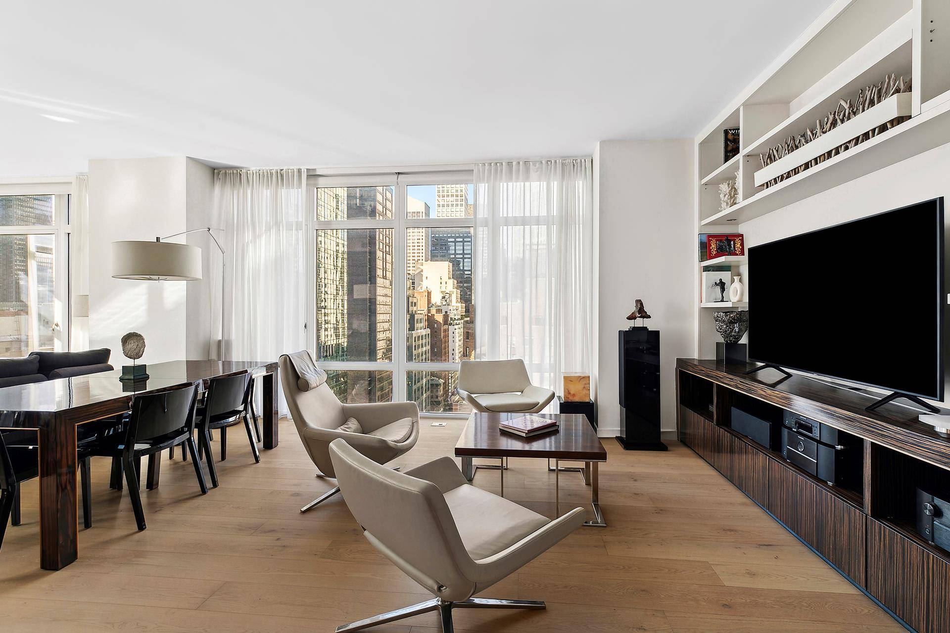Luxury Living in the Heart of Midtown Welcome to Residence 19B at Place 57, a beautifully designed 2 bedroom, 2.