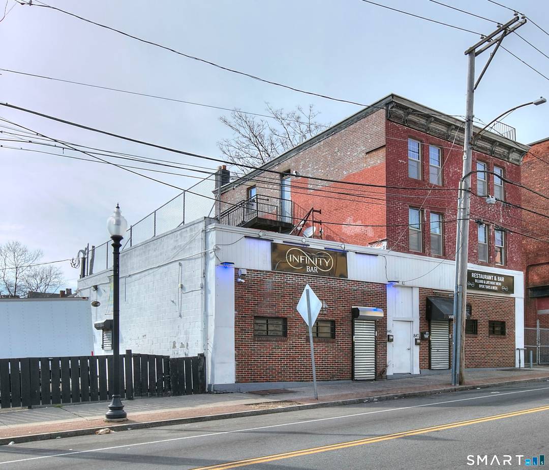 Fully occupied mixed use property generating current rental income with potential for future increases.
