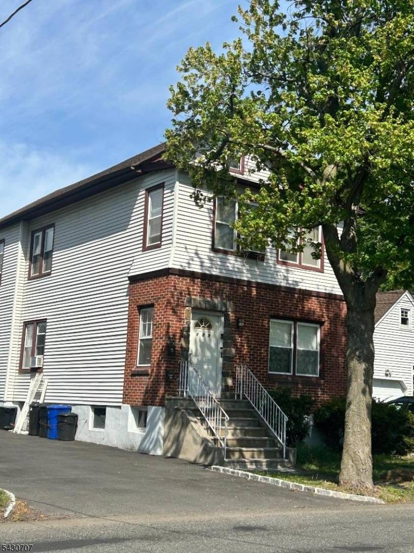 Spacious two family home featuring 2 bedrooms, a large living room, eat in kitchen, and 1 full bath in each unit.