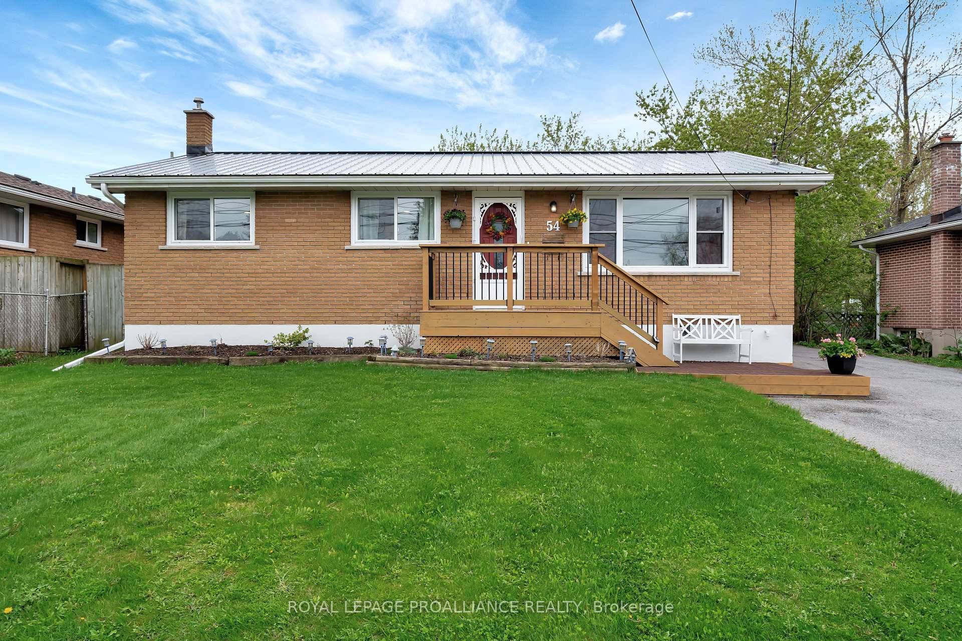 This stunning all brick bungalow offers open concept living with 4 spacious bedrooms and 2 fully renovated bathrooms, featuring newer flooring and stylish new lighting throughout.