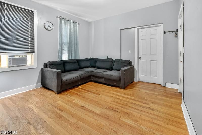 Welcome to 73 75 Tillinghast St, a spacious and versatile multi family home in the heart of Newark.