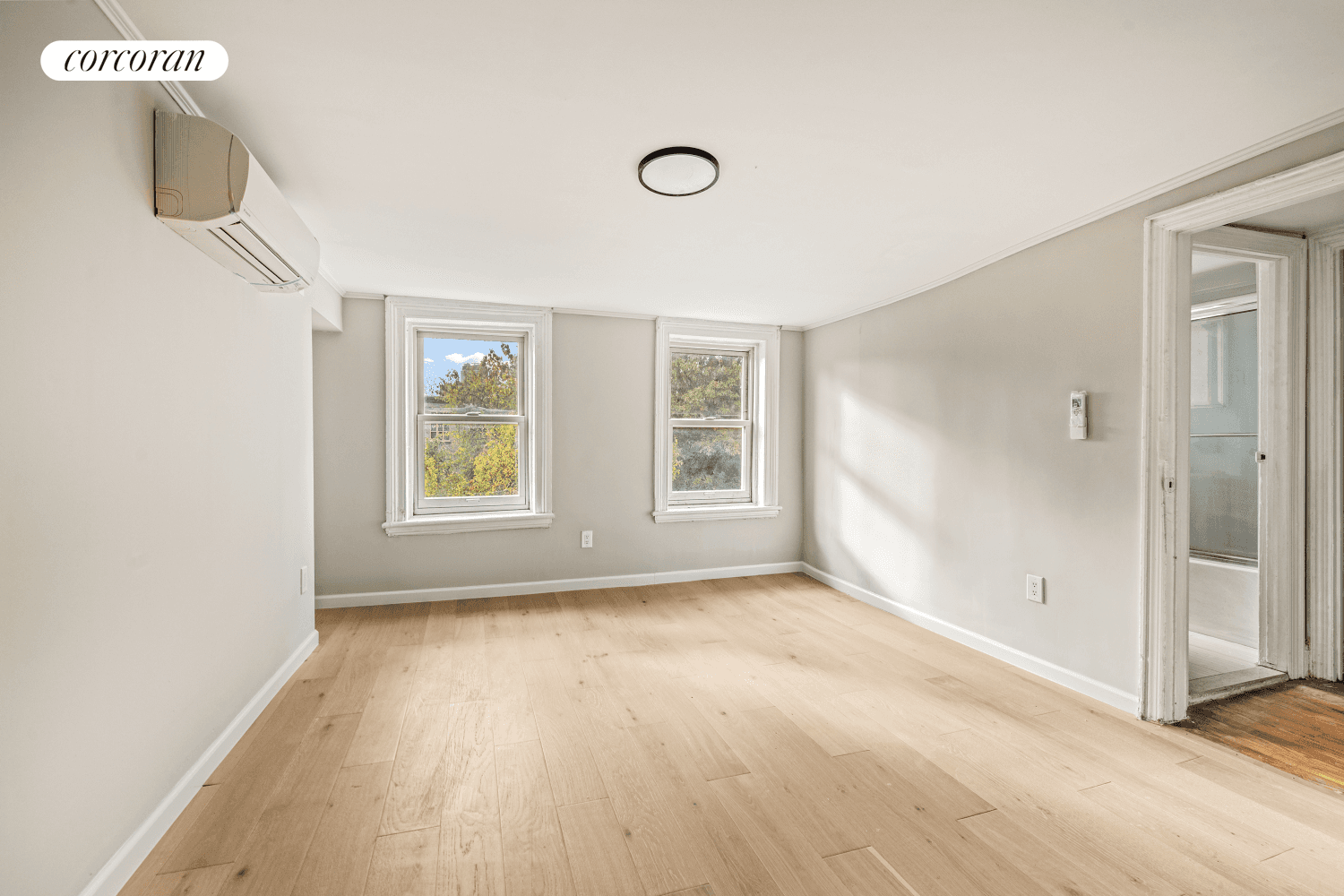 Nestled on a beautiful tree lined street in Clinton Hill, this fully renovated, spacious two bedroom apartment is located on the top floor of a stunning three family townhouse.