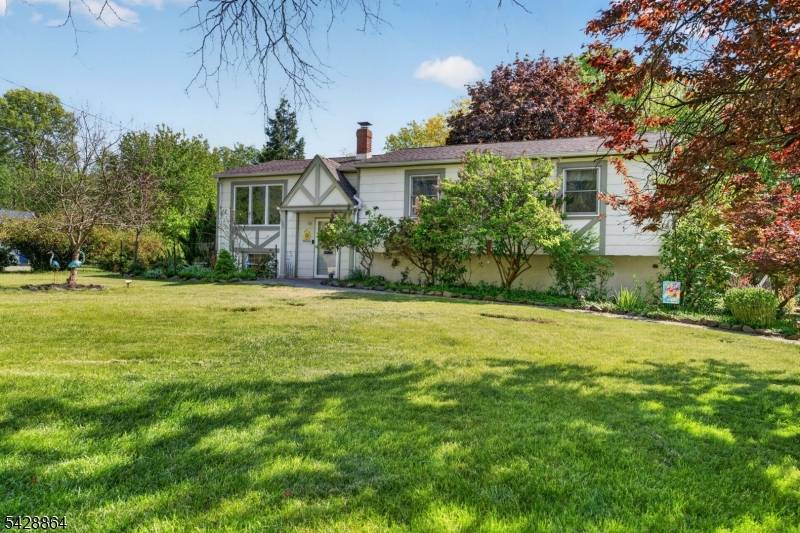 Set on a quiet cul de sac with easy access to major routes and everyday conveniences, this home blends thoughtful updates with inviting living space.