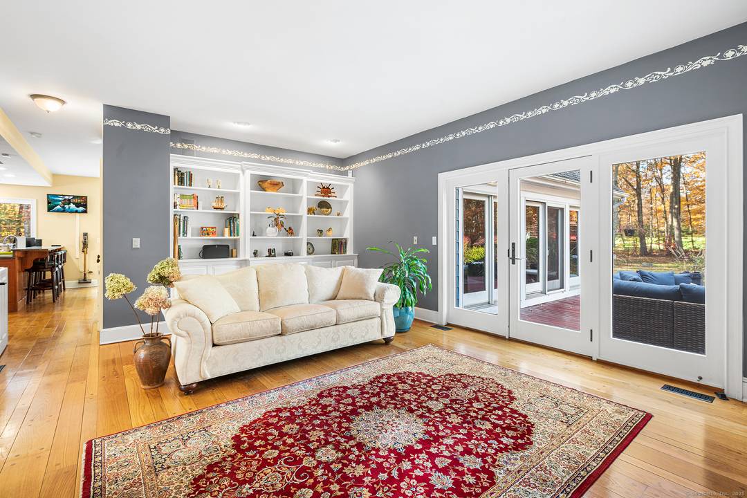 Experience luxury living on Blackledge Country Club in this 6BR, 4.