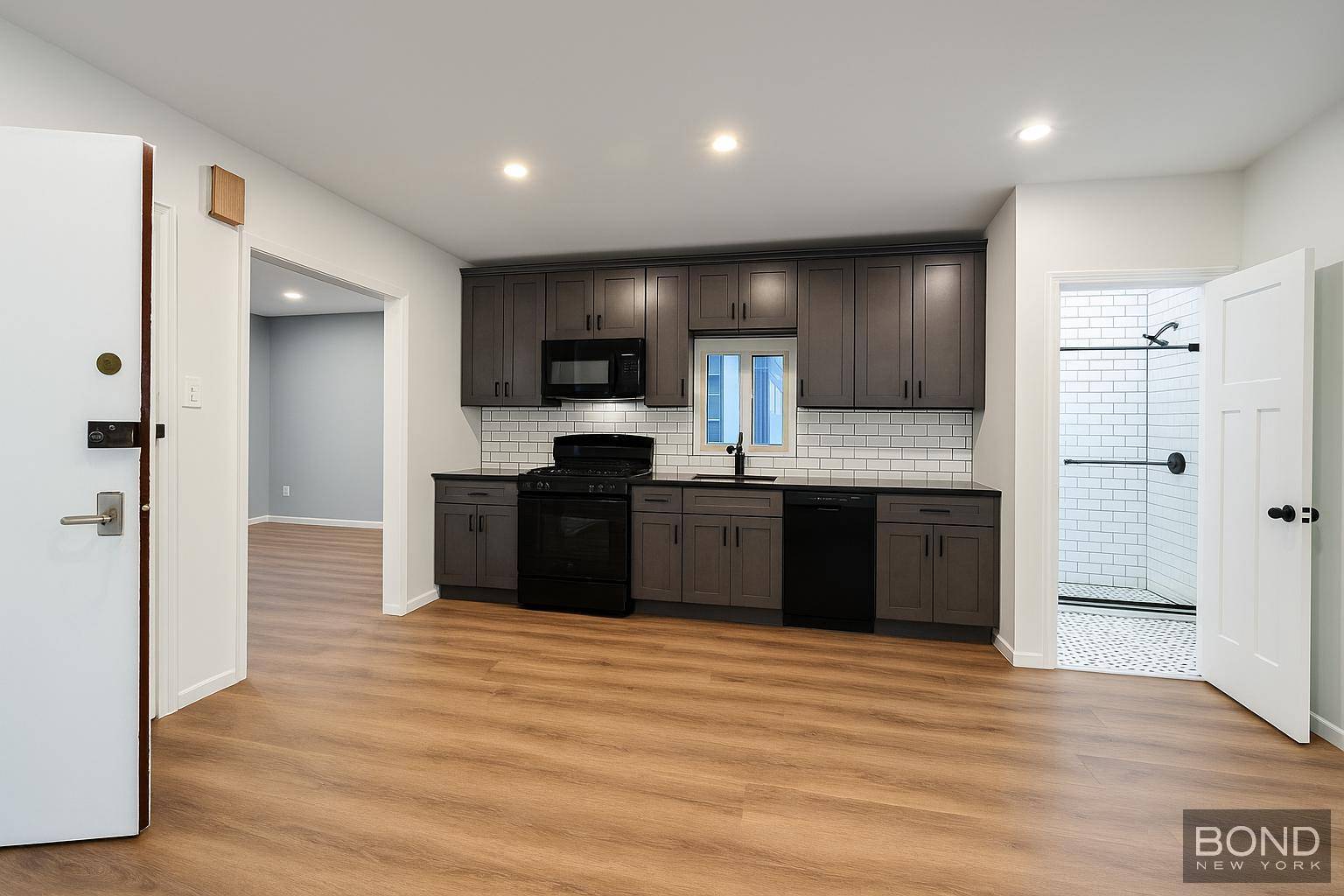 Welcome to 682 Onderdonk Avenue, a spacious, sun filled home that checks every box including style, functionality, and that rare private outdoor space.
