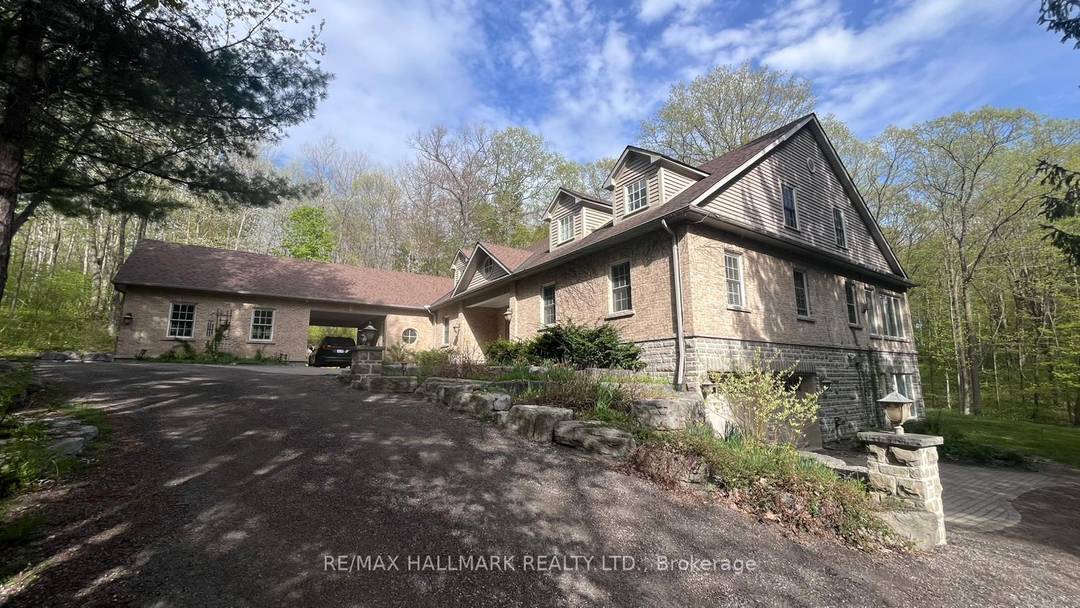 RARE OPPORTUNITY ! ! Enjoy Luxury Estate Living Set On Nearly 5 Acres Of Unmatched Privacy Surrounded By Lush Greenery, Forested Views amp ; Expansive Outdoor Space.
