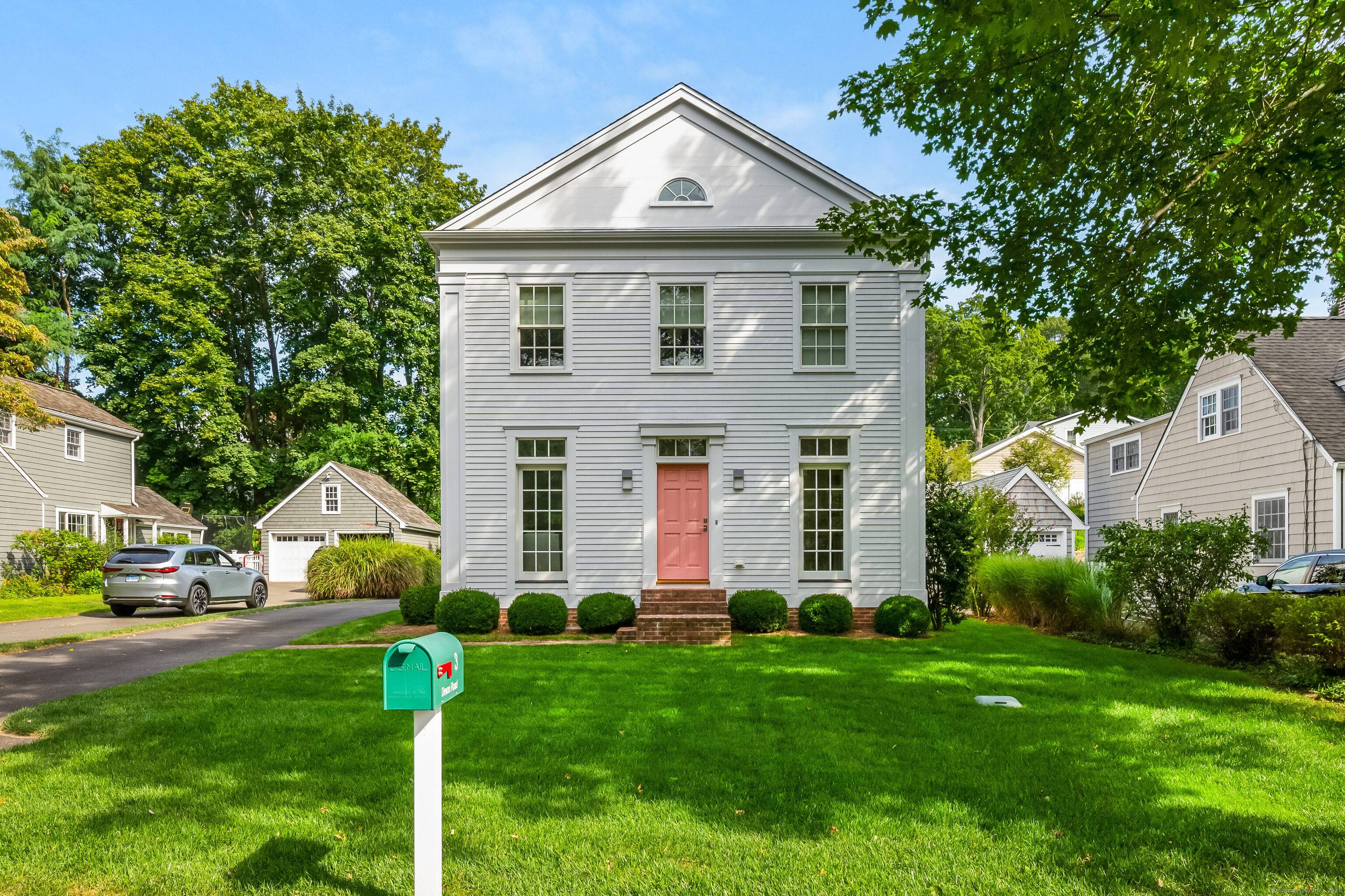 Welcome to 3 Devon Road, a modern gem on a tree lined street in a desirable neighborhood.