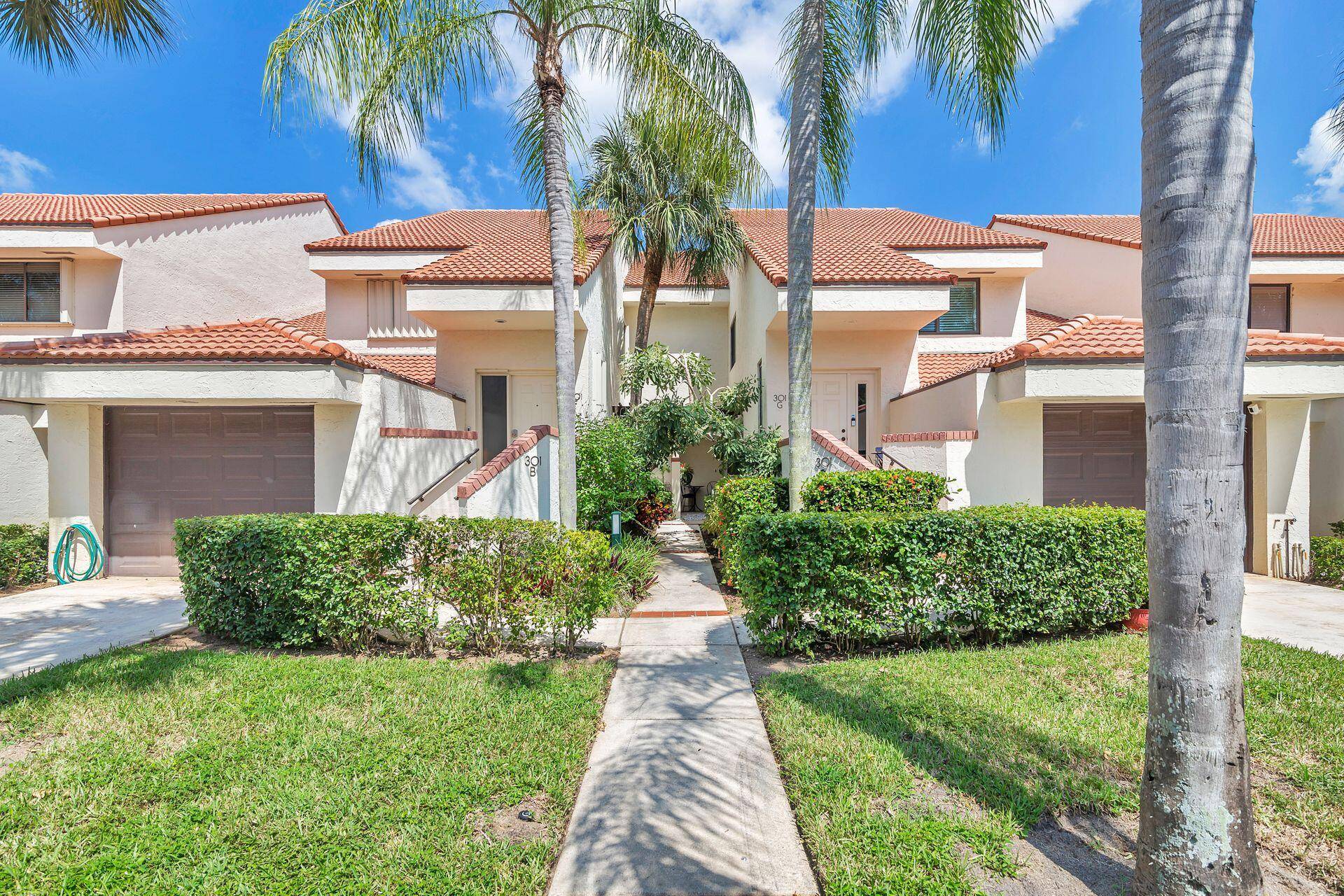 This first floor condo offers step free access and no carpeting, featuring vinyl plank flooring and tile throughout.