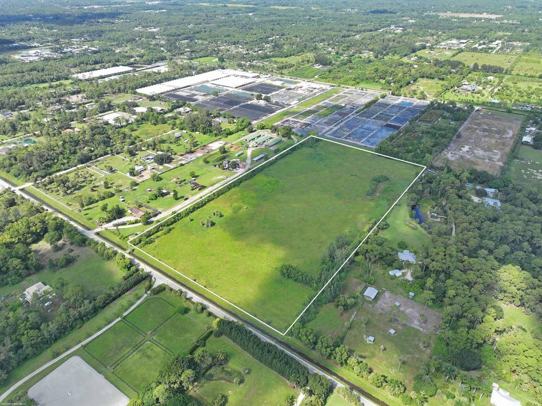 Exceptionally private 20 ACRE property on paved E road with easy access to Okeechobee Rd.
