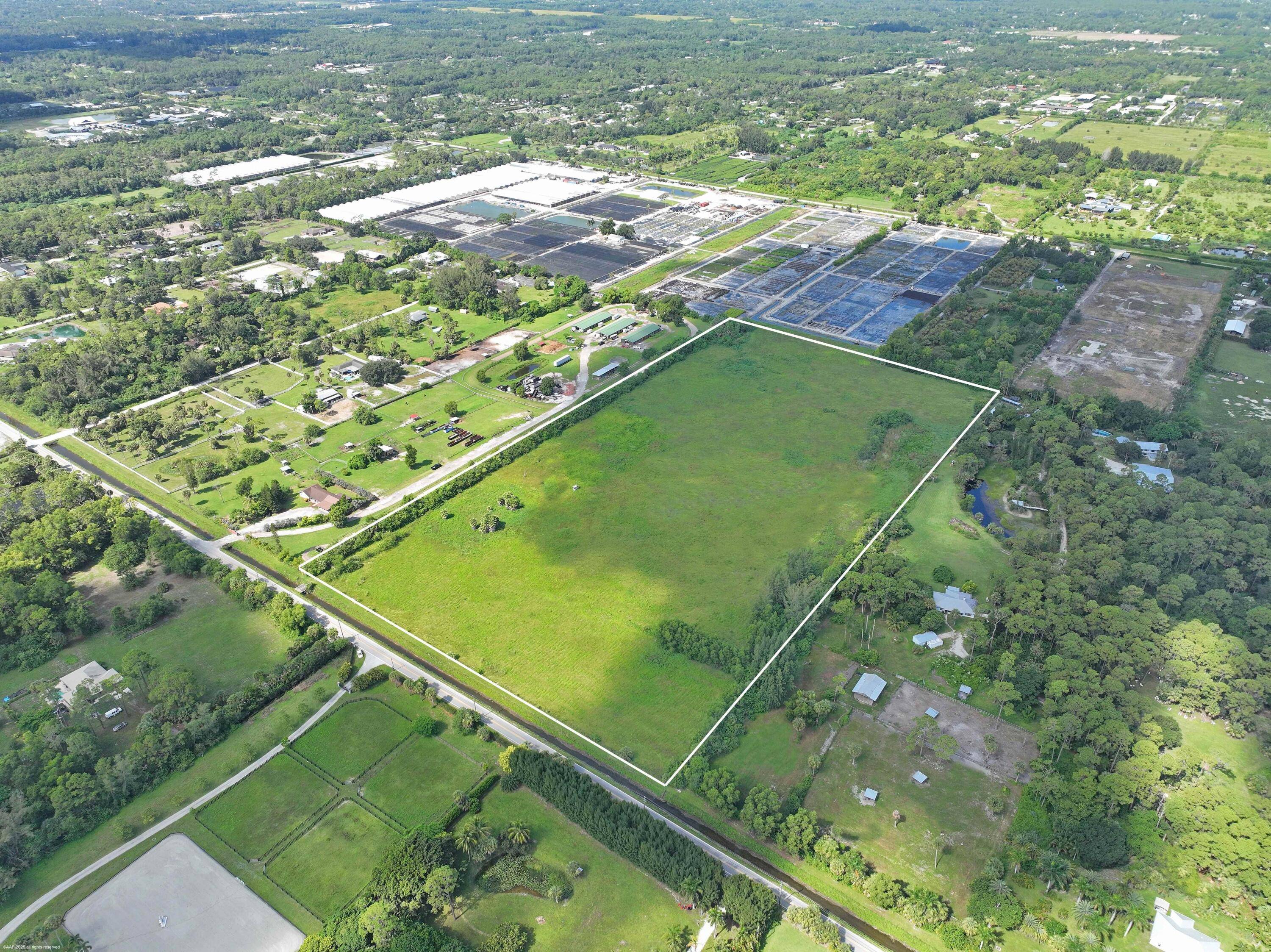 Exceptionally private 20 ACRE property on paved E road with easy access to Okeechobee Rd.