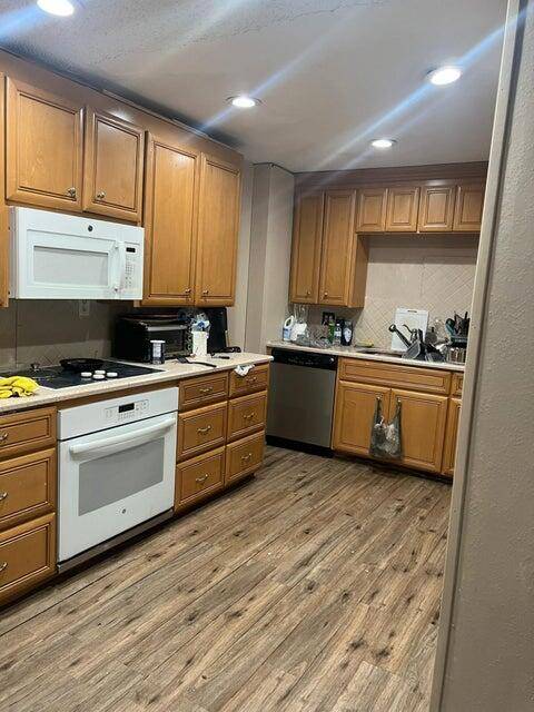 First Floor 3 Bed 2 Bath Condo Move In Ready Perfectly Located !