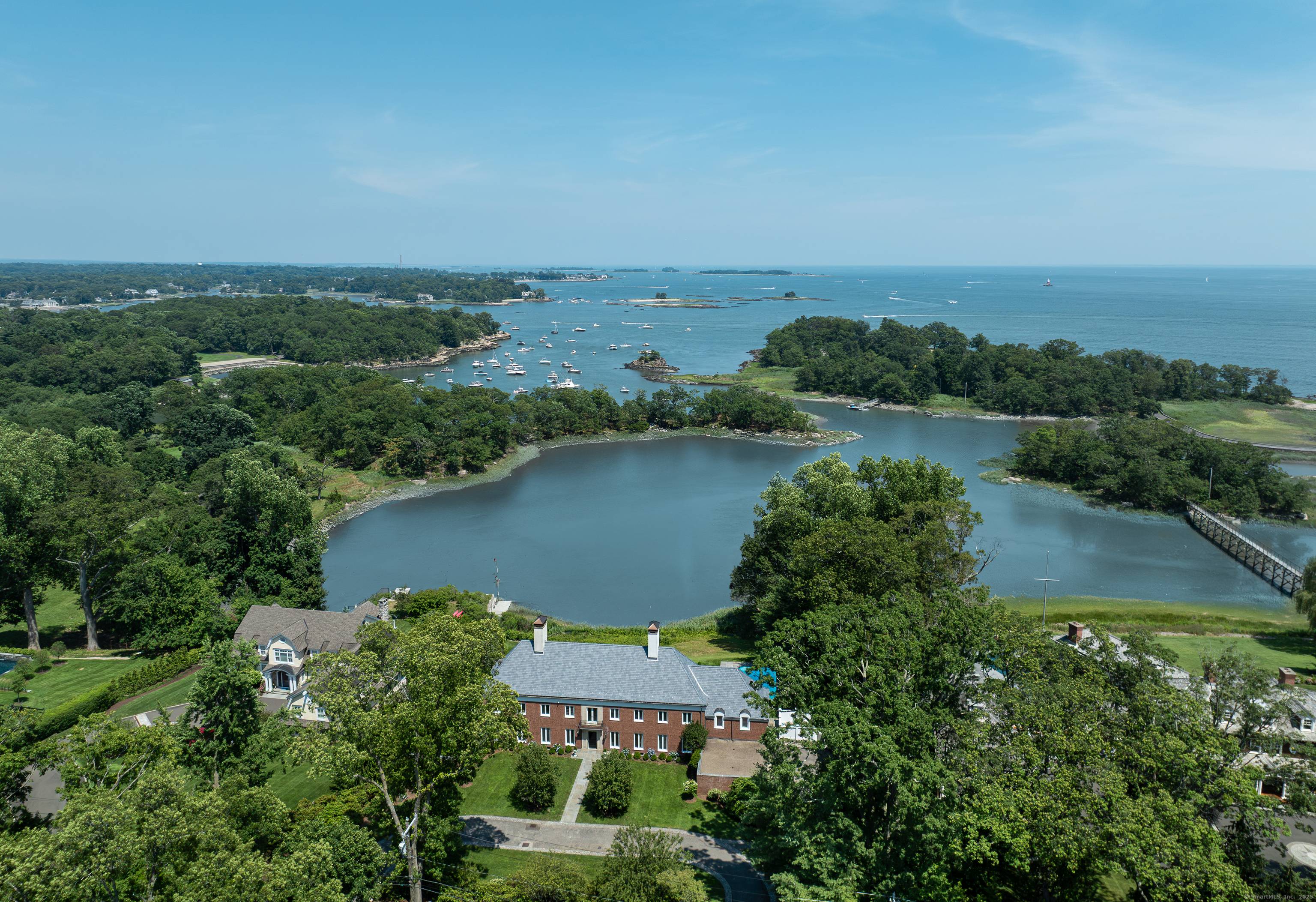 Perched high on the bluff of Long Neck Point, this 6680sf custom built brick estate offers you unmatched privacy and panoramic water views, all in this captivating natural environment where ...