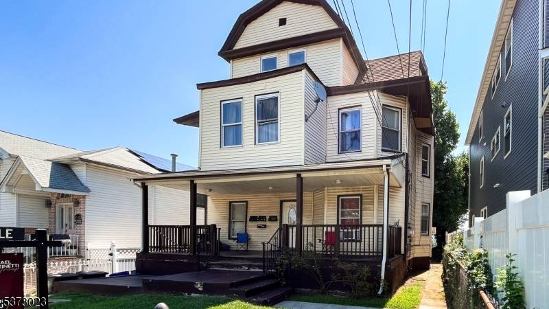 Opportunity knocks with this charming 3 family Colonial.