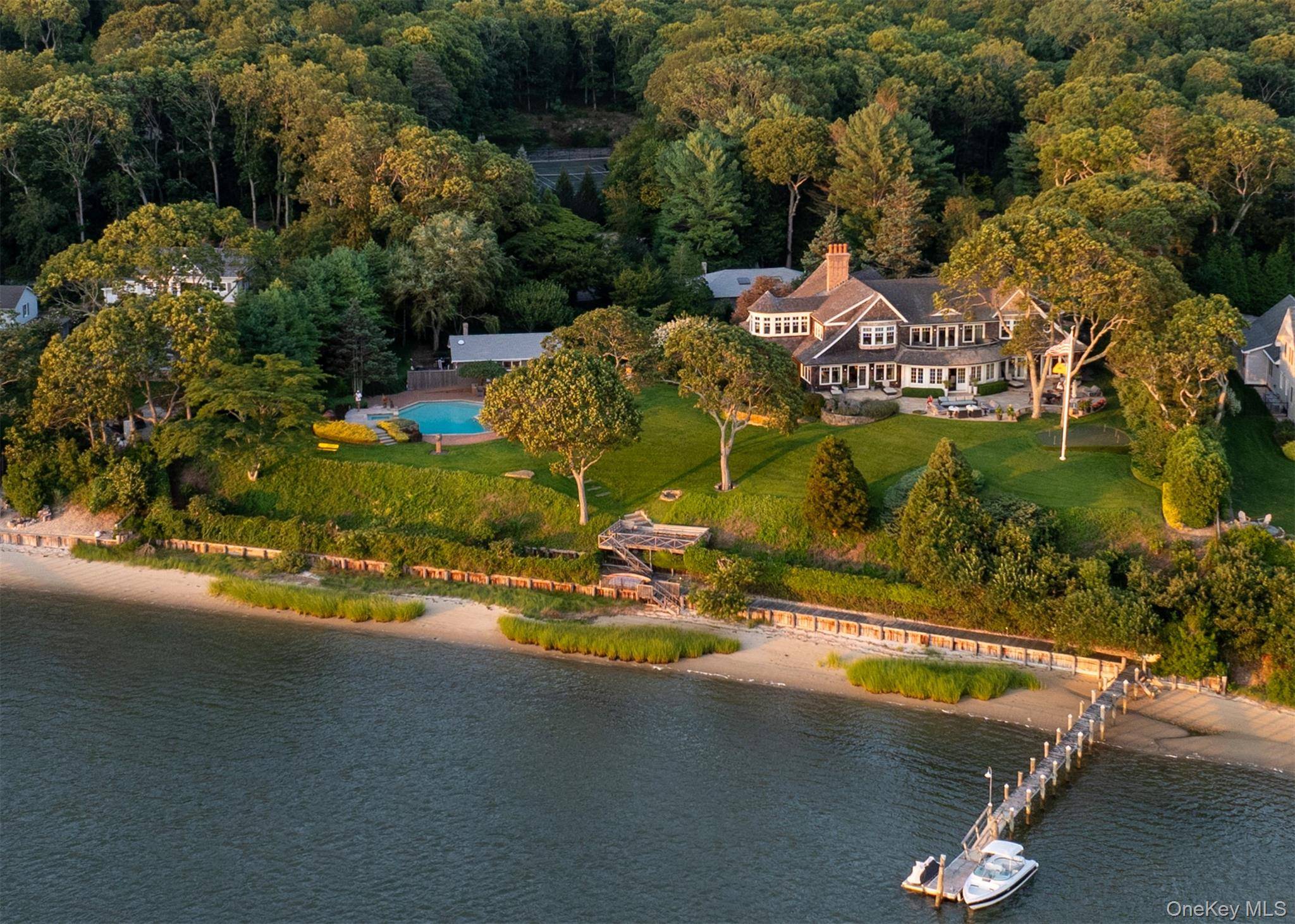 Rarely available in size, scope, and setting, this generational Nassau Point estate is a standout along the Peconic Bay its beauty long admired by passing boaters.