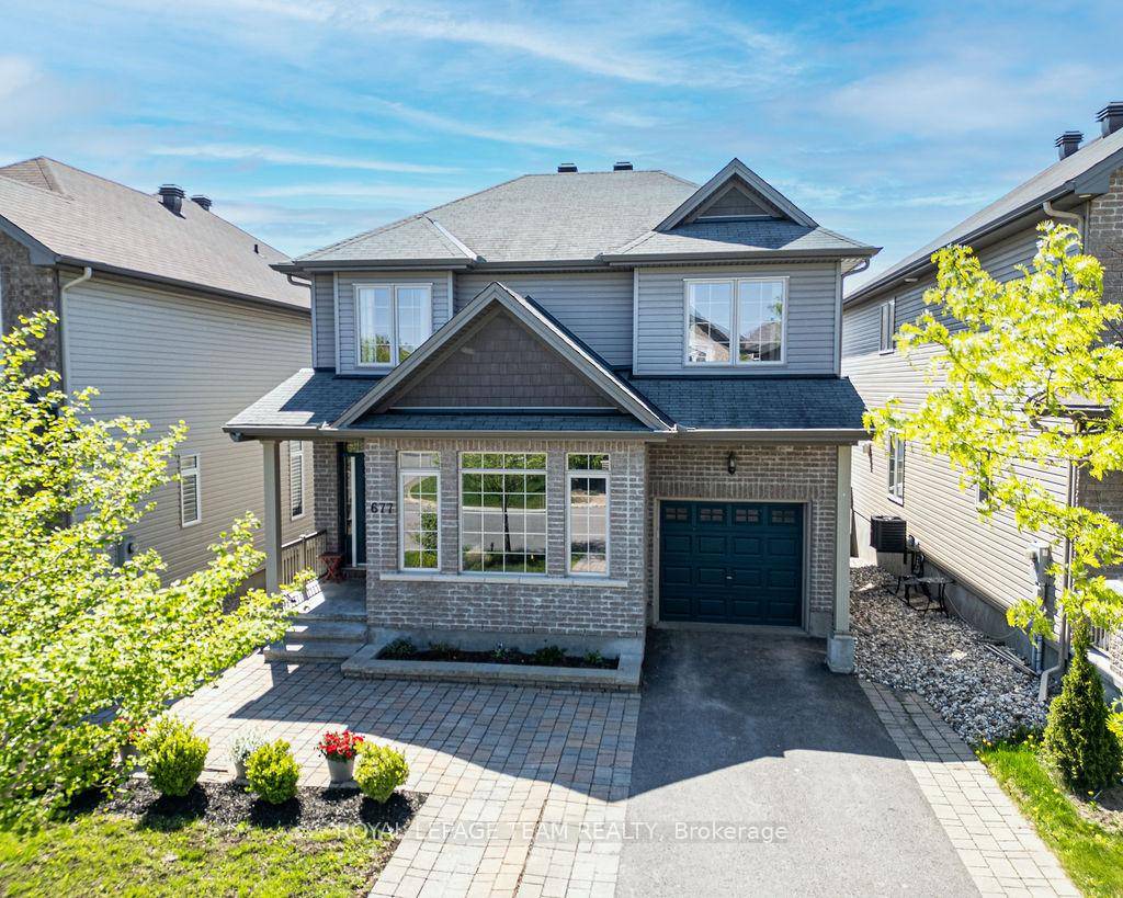 Welcome to this beautifully upgraded 4 bedroom, 3 bathroom home in the family friendly community of Findlay Creek.