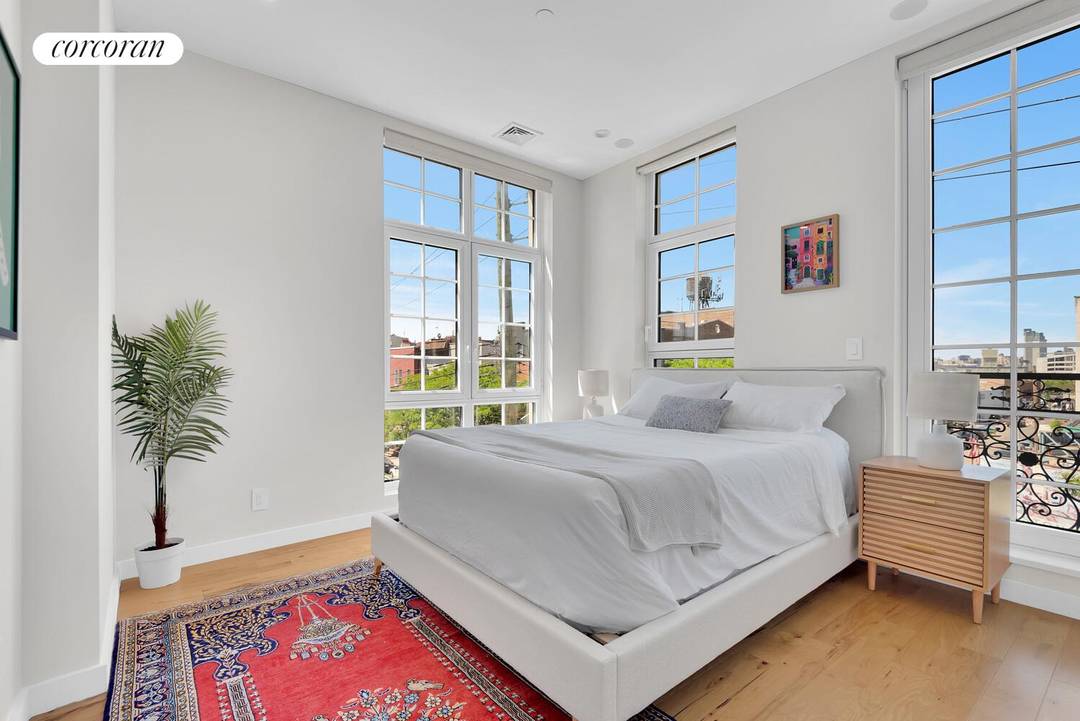Sun Drenched Corner Triplex with Manhattan ViewsThis townhouse inspired upper triplex offers the expansive scale and privacy of a private home within an intimate boutique condominium.