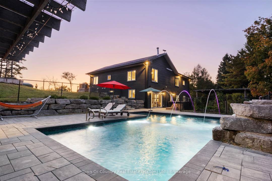 Welcome to 5041 Third Line in the south end of Erin where comfort, style, and serenity come together on a sprawling 1.