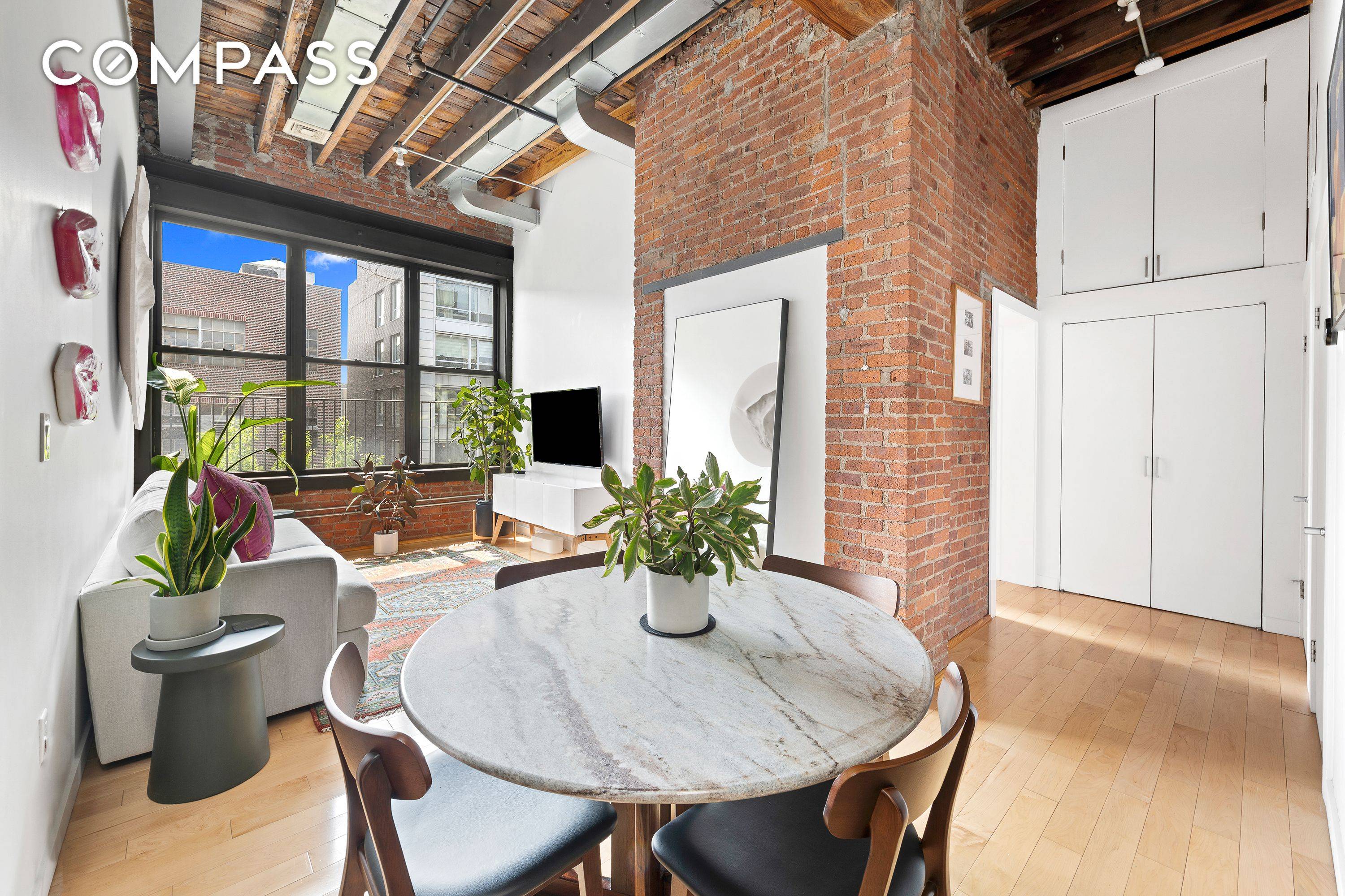 This absolutely stunning apartment is a Williamsburg loft dream come true with a massive private outdoor rooftop !