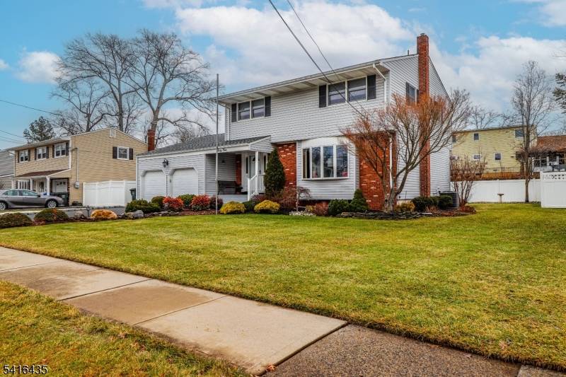 Prime Location ! Amazing four bedroom 2 1 2 bath colonial on quiet street in desirable Claremont Section with EZ access to NY train airport main roads schools parks shops ...