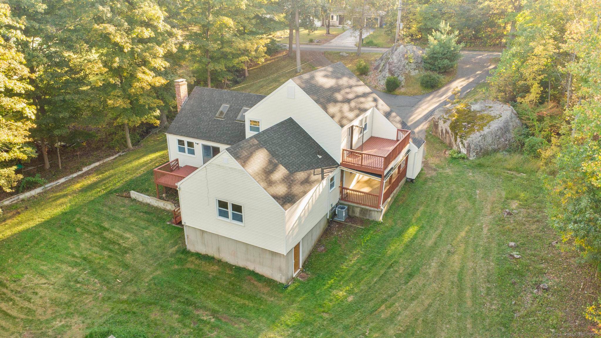 Welcome to 154 Chimney Hill Road, just under 1 acre, offering over 2, 500 sq.