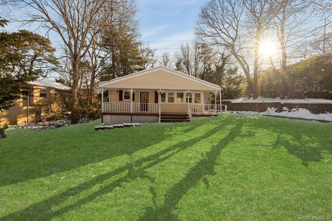Welcome to this beautifully renovated home located in the highly sought after Sachem School District, set on a quiet cul de sac in Farmingville and offering insanely low taxes.