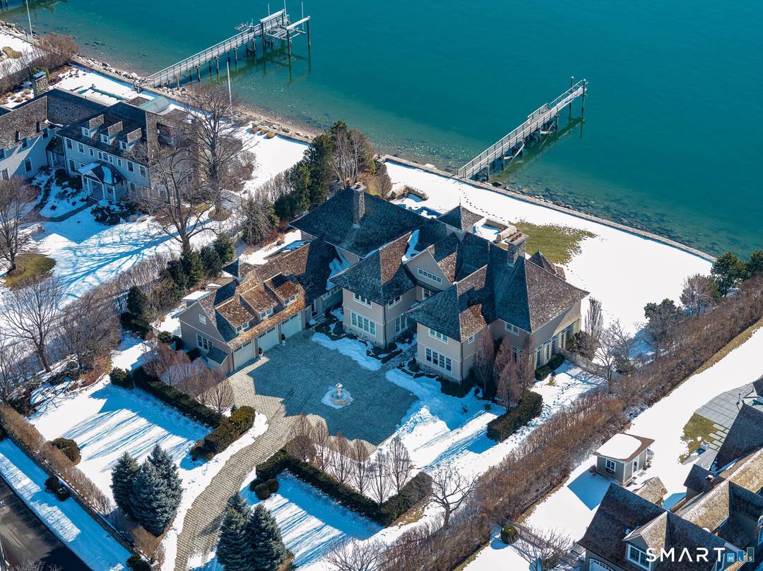 Rarely does an opportunity arise to own a home in the coastal enclave of Shorehaven, and 10 Shorehaven Road is a true masterpiece.