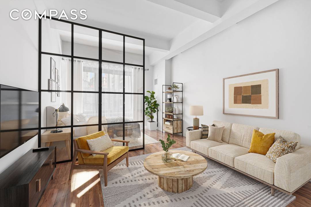 Welcome to Unit 411 at 88 Greenwich Street, a beautifully curated loft style residence situated in one of Downtown Manhattan s most iconic Art Deco condominium buildings.