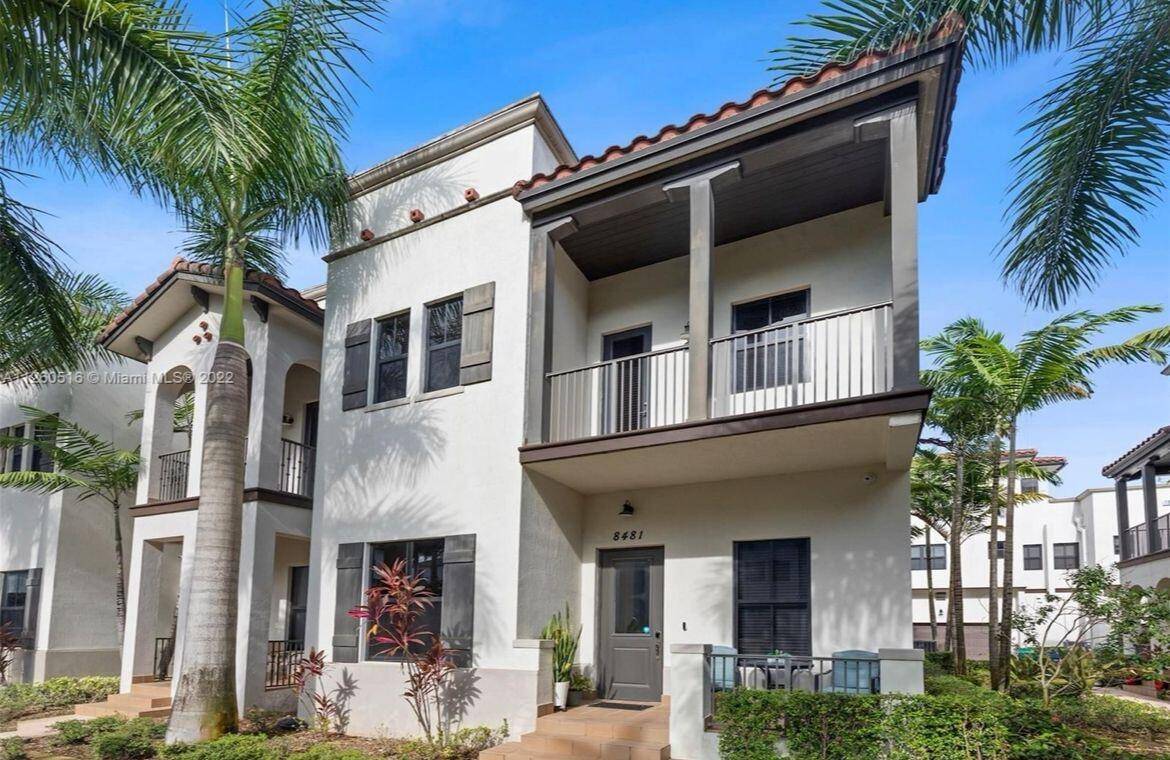 Enjoy living in a luxury and contemporary 4 Bed and 3 FBath corner townhome in Downtown Doral.