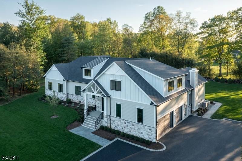 Brand New Luxury Custom Home offering Modern Single Level Living with a spectacular open floor plan with cathedral ceilings and unparalleled convenience.