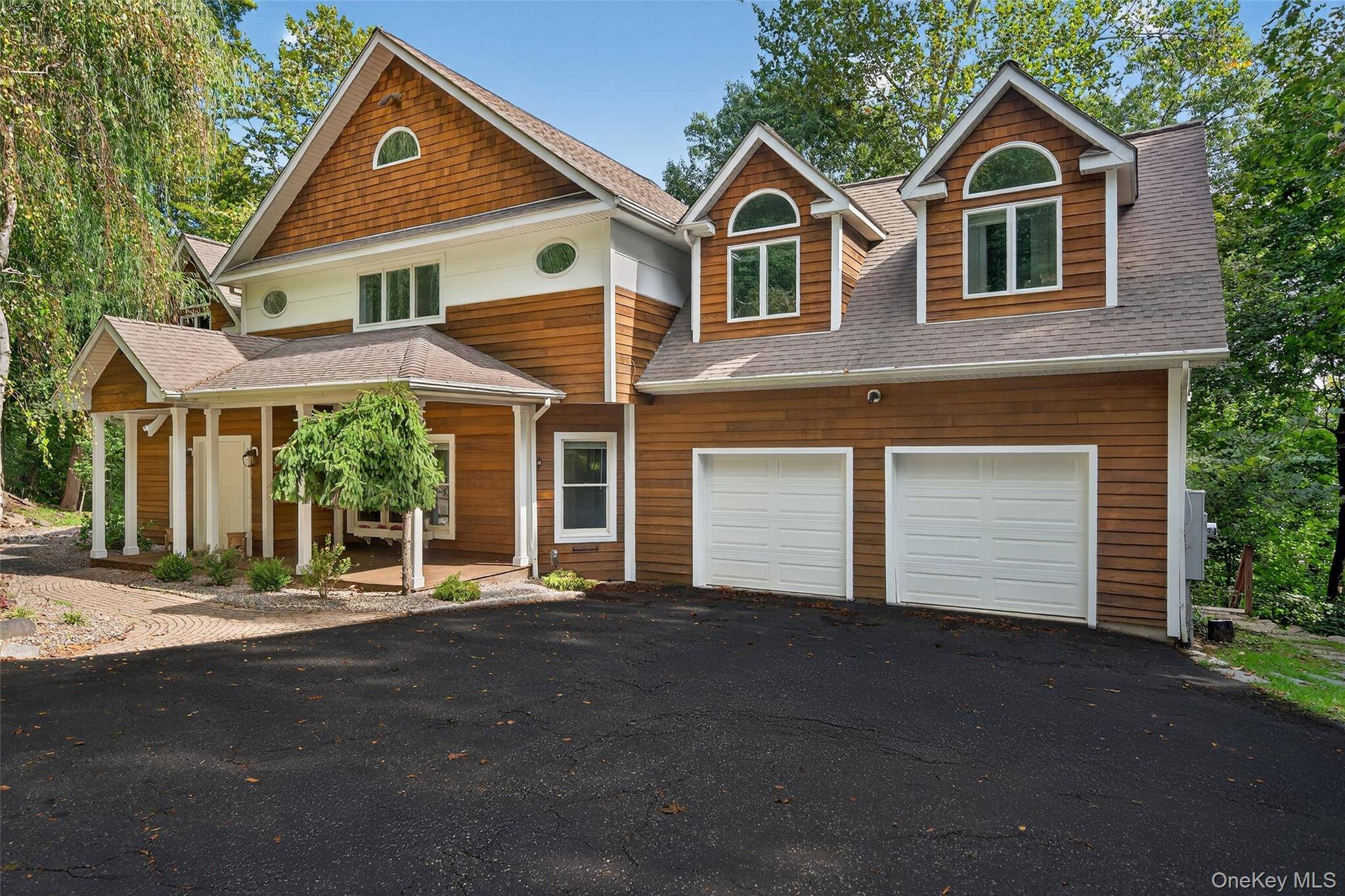 Located in the sought after South Orangetown School District, this stunning 4 bedroom, 3.