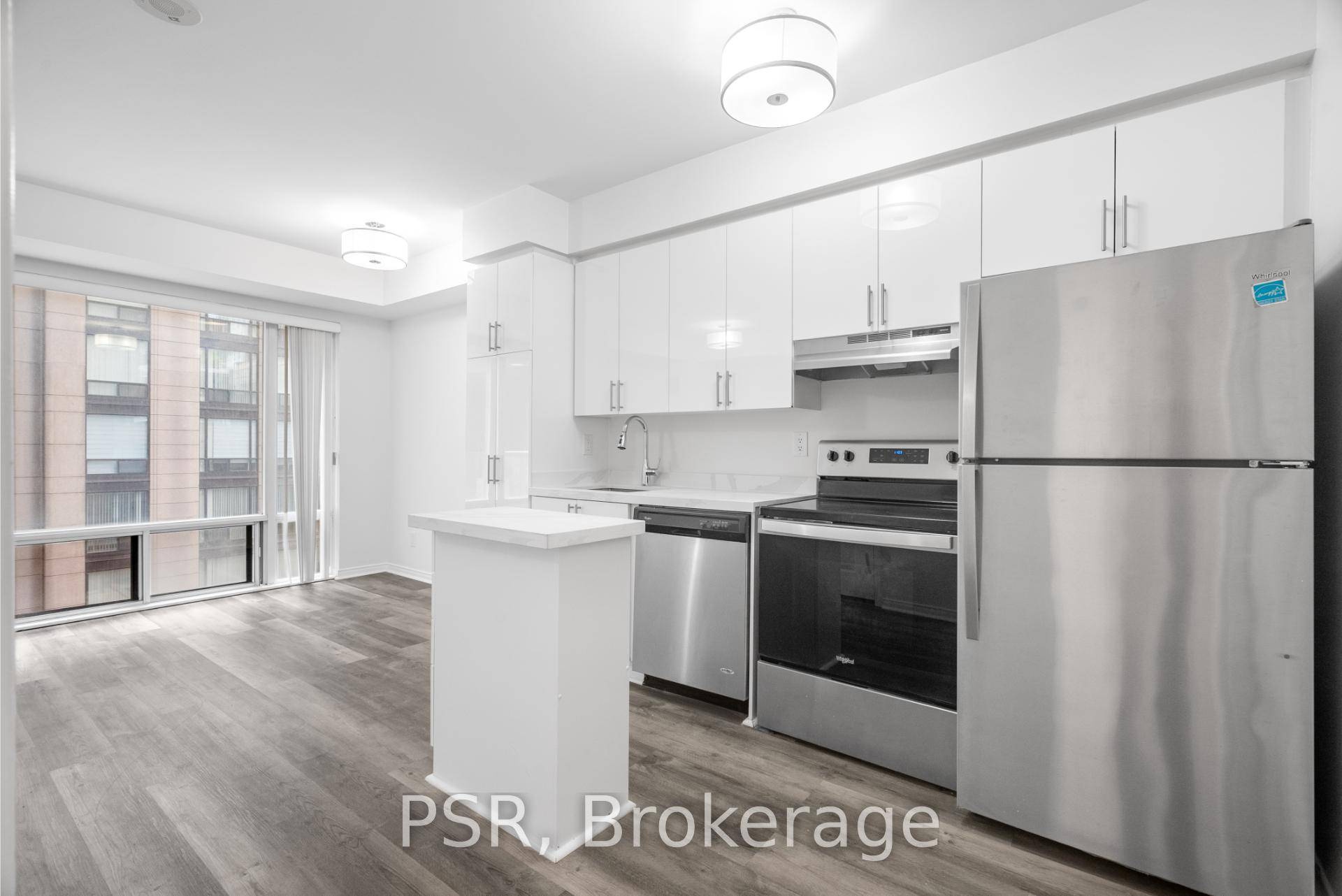 This stylish studio features a functional layout with modern finishes, a sleek kitchen, and a cozy living sleeping area.