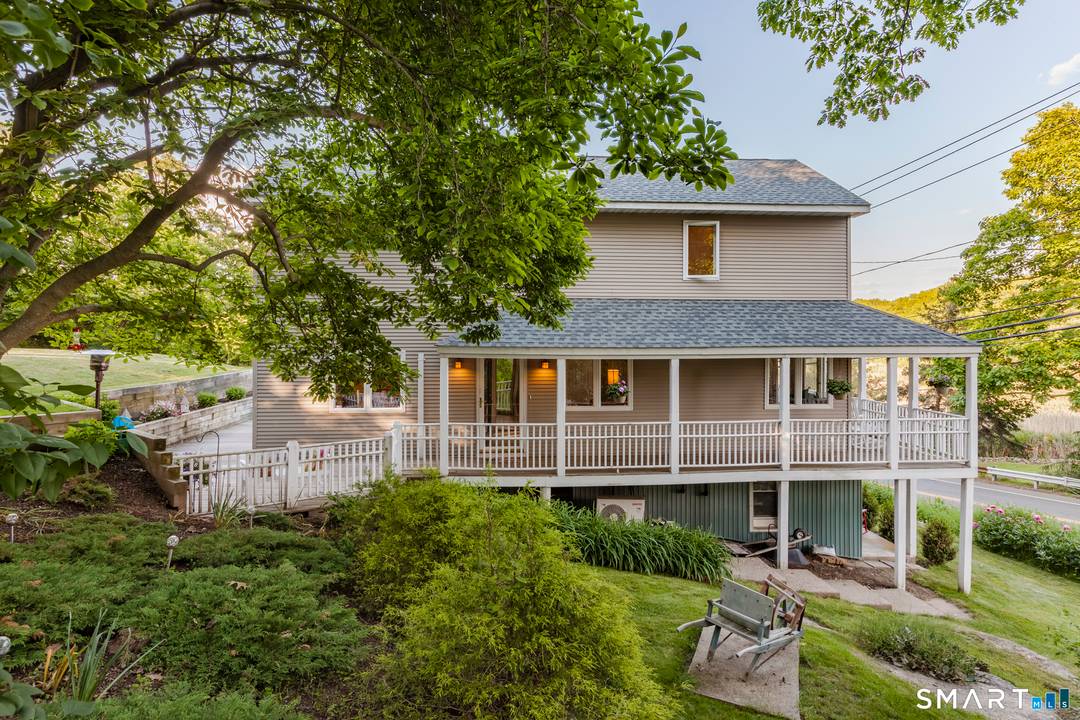 Just one mile from the historic Guilford Green, this like new Contemporary Farmhouse offers a rare blend of modern comfort, coastal charm, and beautiful natural views.