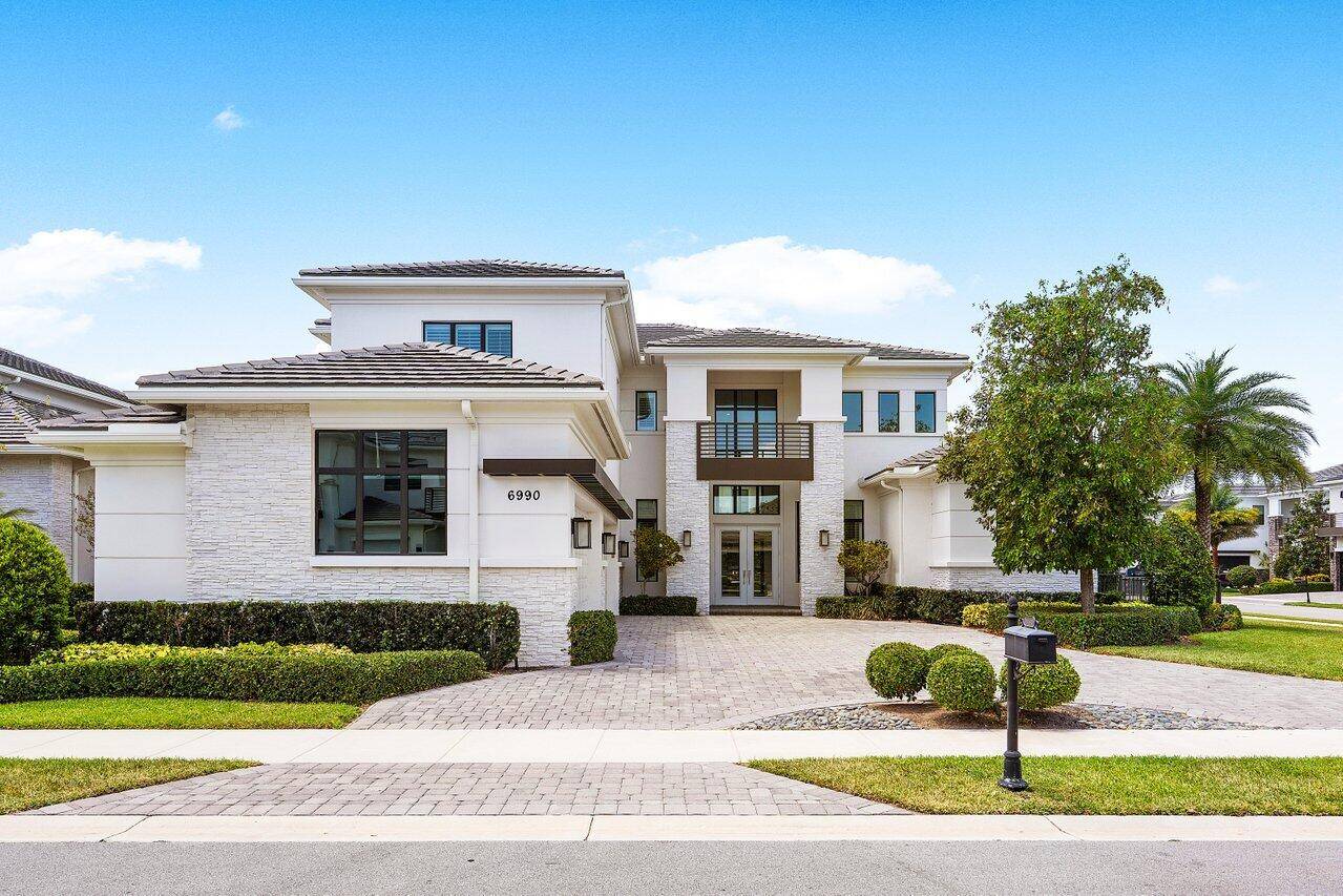 Welcome to an extraordinary offering in Royal Palm Polo, one of Boca Raton's premier luxury community.