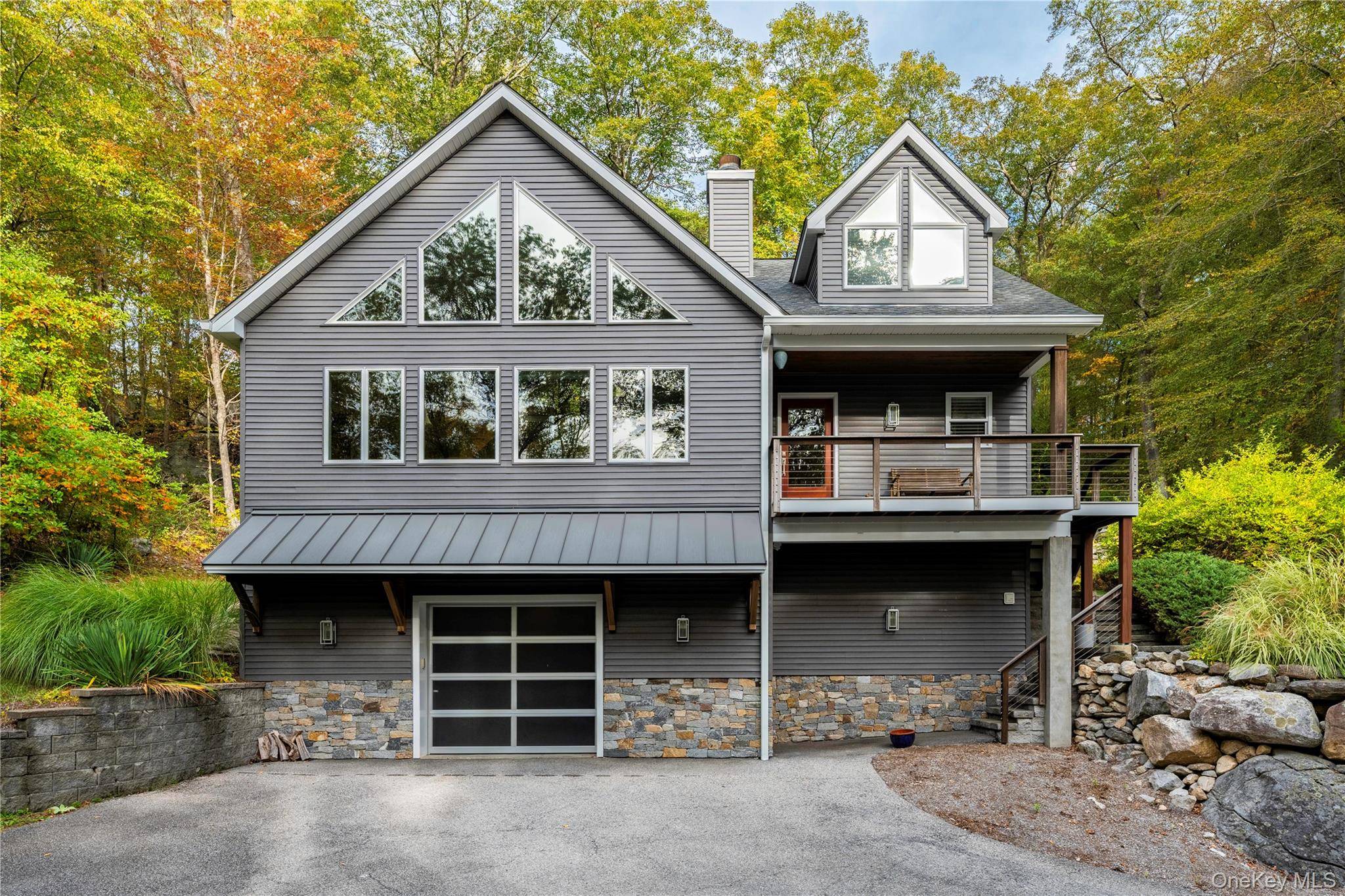 Welcome to your Hudson Valley retreat in the Lake Sagamore community, where outdoor living takes center stage.