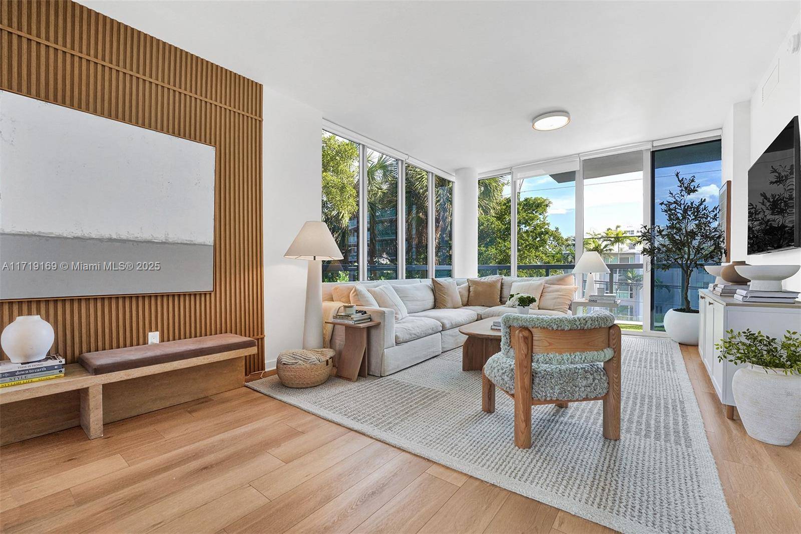 Discover this beautifully renovated CORNER unit that embodies minimalist style and offers a SPACIOUS TERRACE.