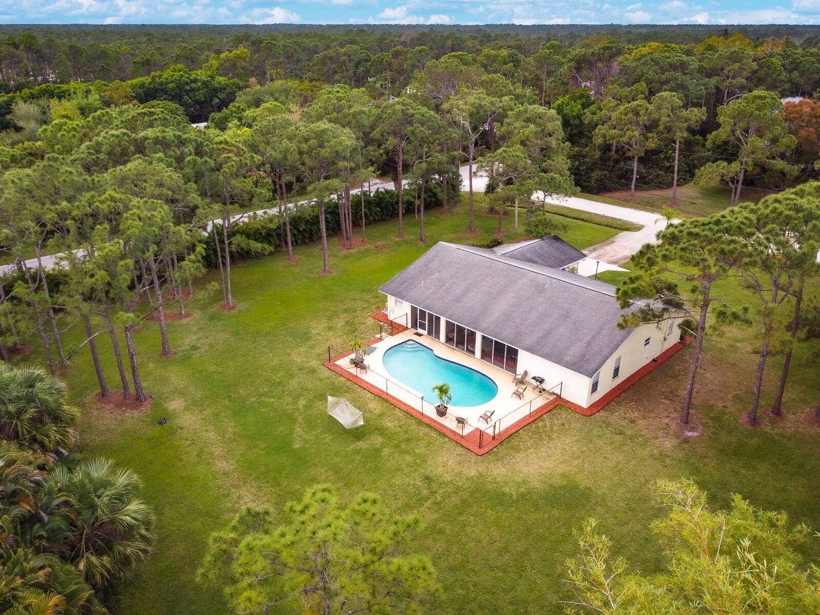 Immaculate CBS 3 bedroom 2 bath 2 car garage home in PB Country Estates.
