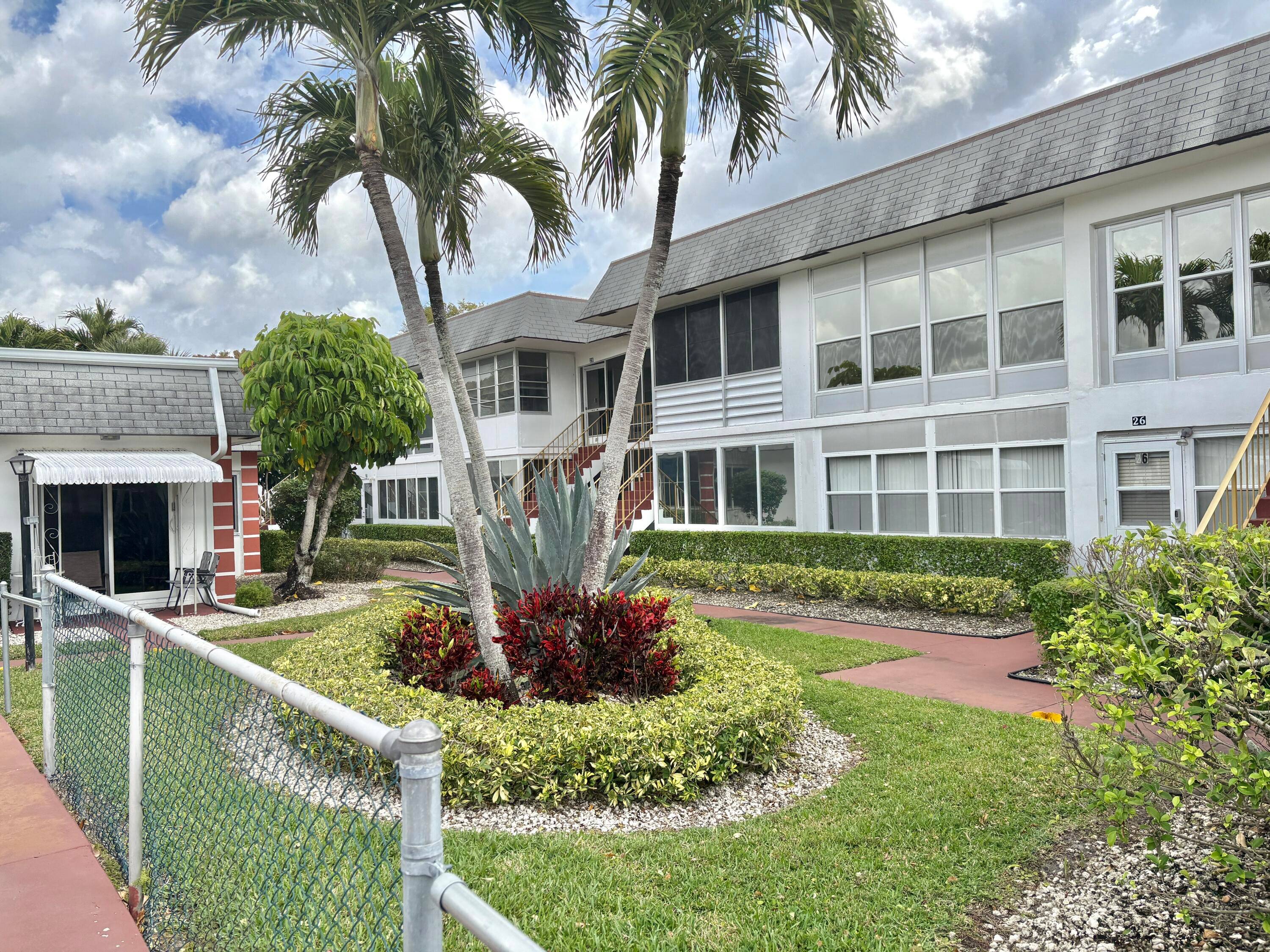 For sale in a 55 retirement community of Century Village an absolutely move in condition 2 Bedroom, 2 Full updated Baths condo for sale on the second floor.
