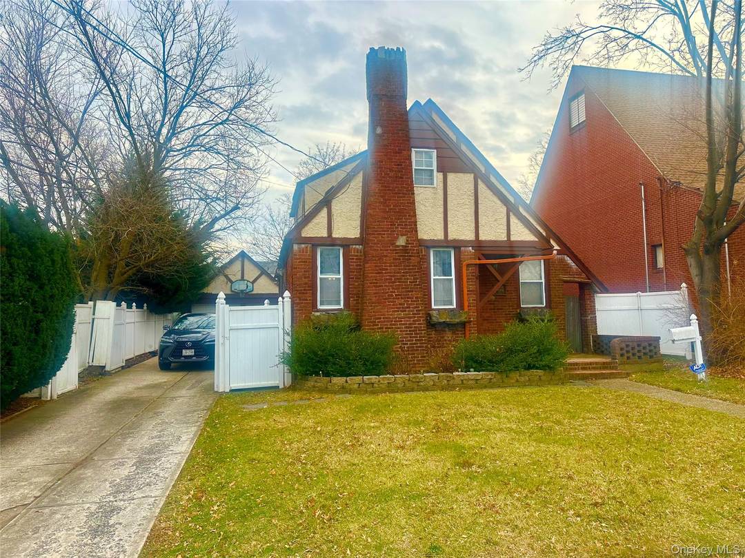 Beautiful Brick Cape home located in North Baldwin, very cozy home with fireplace in living room, dining room, kitchen, first floor 2 bedroom and full bath.