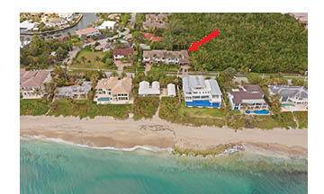 Magnificent walled and gated residence directly on Ocean Blvd with deeded beach access through a private locked gate.