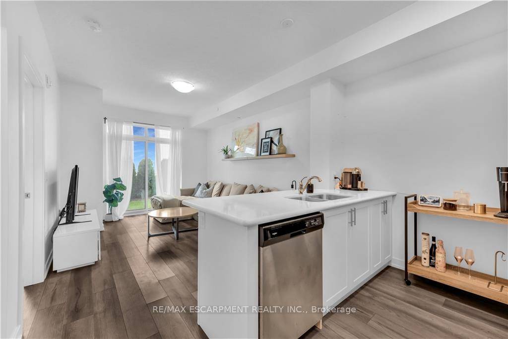 Welcome to Utopia ! This gorgeous 1 bedroom plus den condo is loaded with modern features including quartz countertops, undermount sink, vinyl flooring, S S appliances, a private walk out ...
