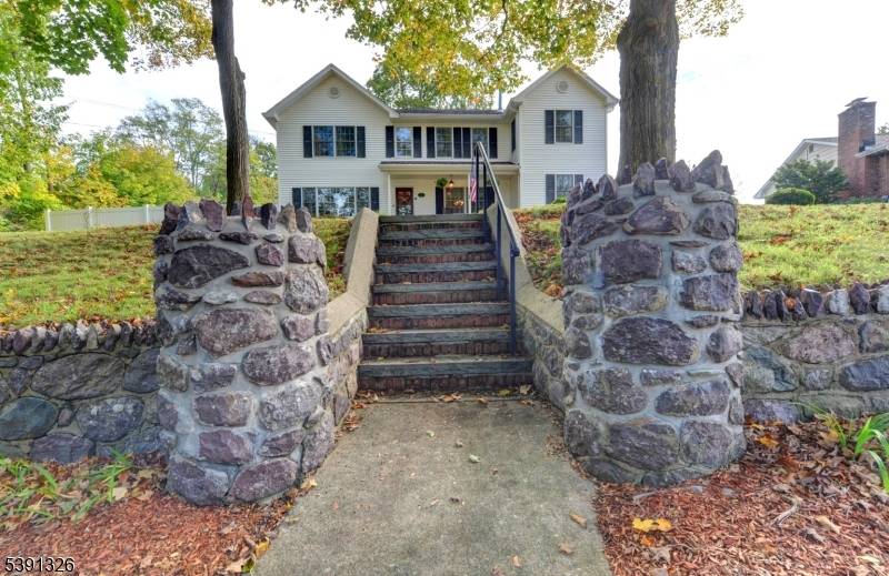 Welcome to your dream Colonial home, perfectly situated in a picturesque setting.