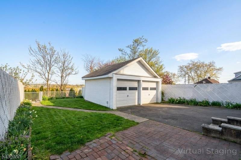 Maximize your real estate portfolio with this exceptional three unit home at 8 Witherspoon St in Nutley.