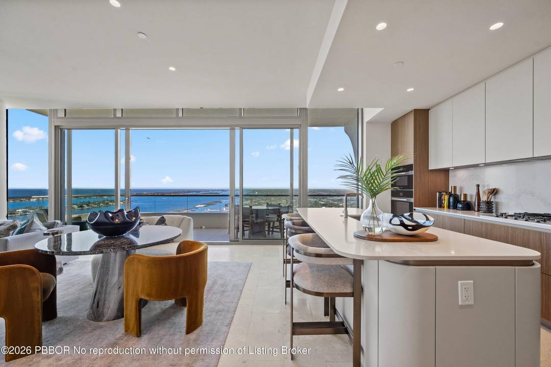 This 23rd floor residence at La Clara offers sweeping ocean and Intracoastal views and beautifully curated interiors designed by Marc Michaels Interior Design.