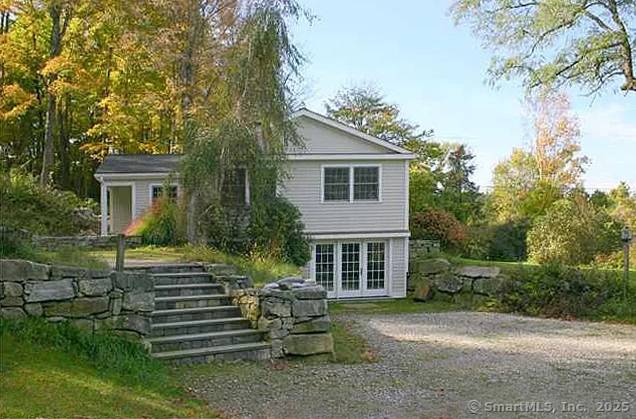 Graceful Home with Views On 2 Sharon, CT acres, this beautiful home offers single floor living with the added bonus of a versatile Lower Level with walk out.