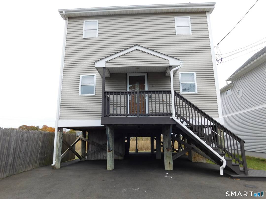 One of a very few affordable Connecticut shoreline homes with beautiful views !